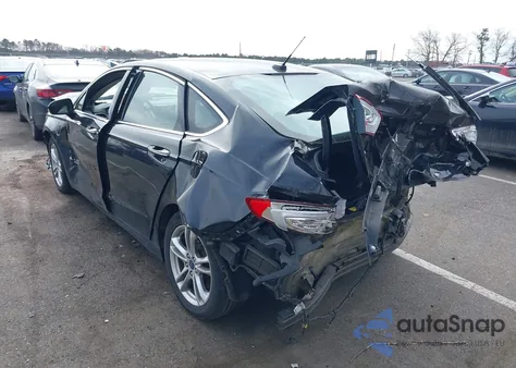 2015 Ford Fusion Energi Titanium z USA, uszkodzony, nr VIN 3FA6P0SU6FR287140